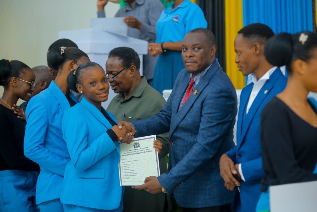 A warm handshake for a graduating student