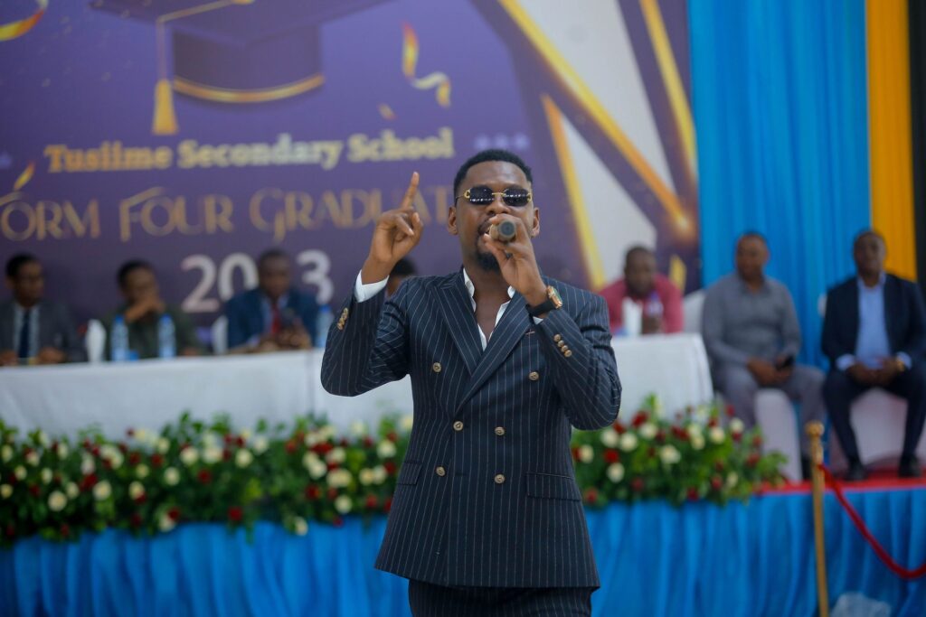 The MC keeps the celebration lively