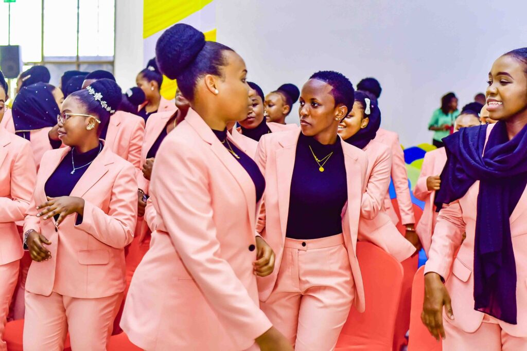 Classmates share a word before the ceremony begins
