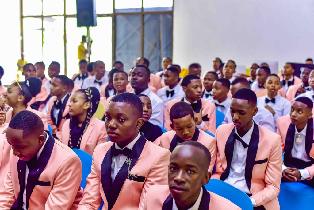 The young men follow the proceedings
