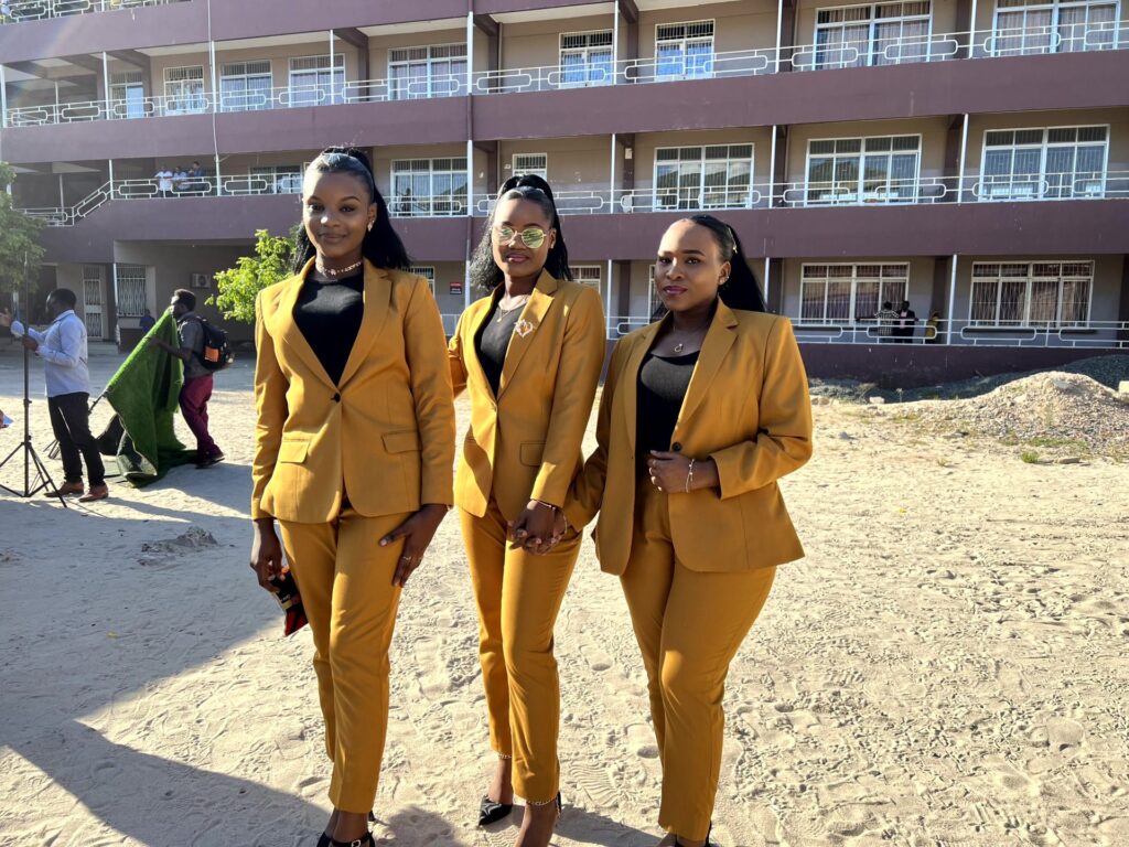Friends in matching golden suits, ready for the big day