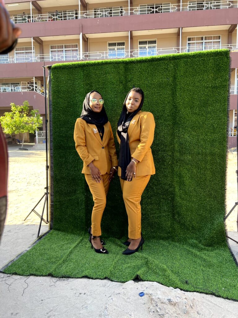 Graduates pose together at the morning photo session
