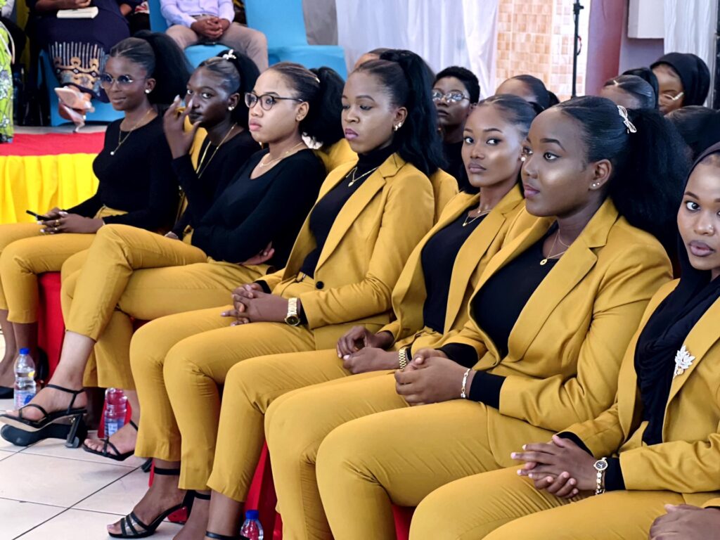 The girls follow the proceedings from the front rows