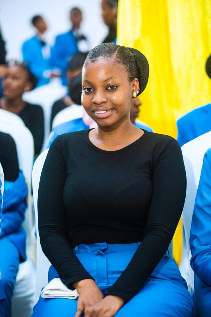 A graduate beams with pride on her big day.