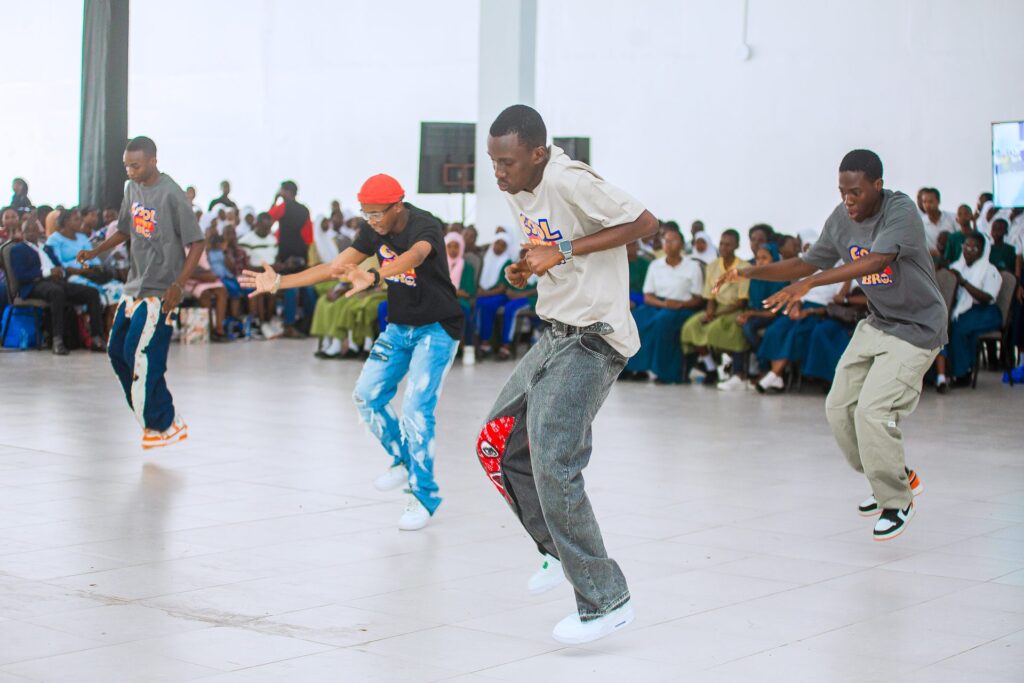 A dance crew entertains the gathering.