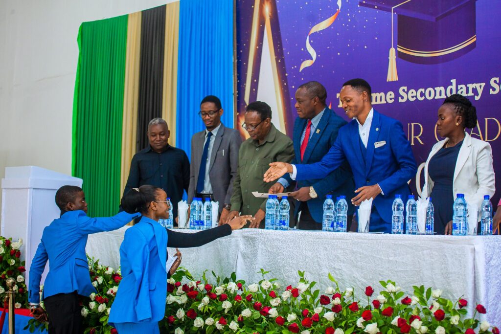 Congratulations from the high table as students are recognised.