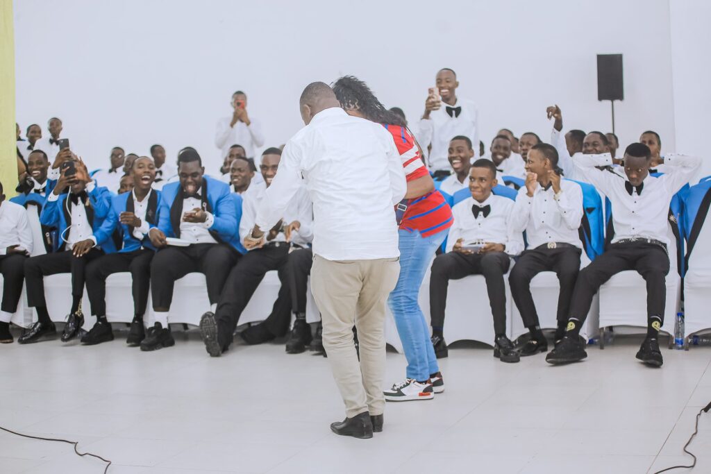 Laughter all round as graduates enjoy the entertainment.