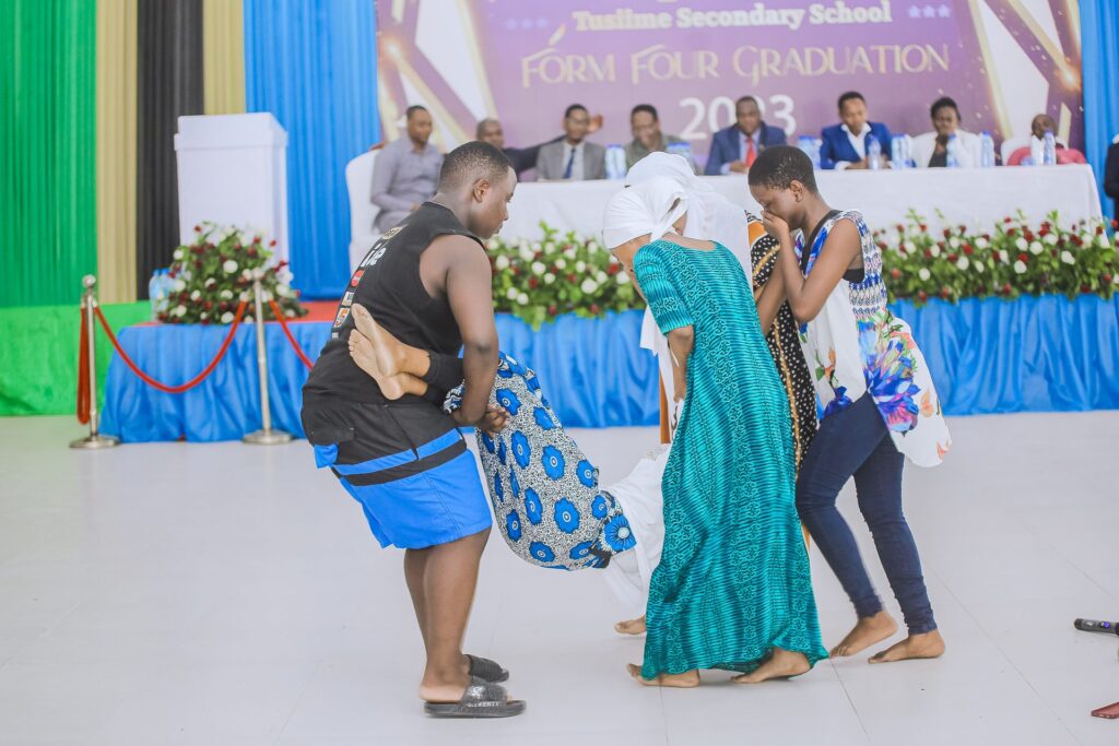 Students stage a drama performance for the gathering.
