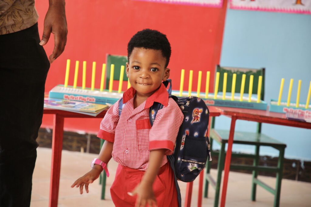 Arriving with a backpack and a big smile