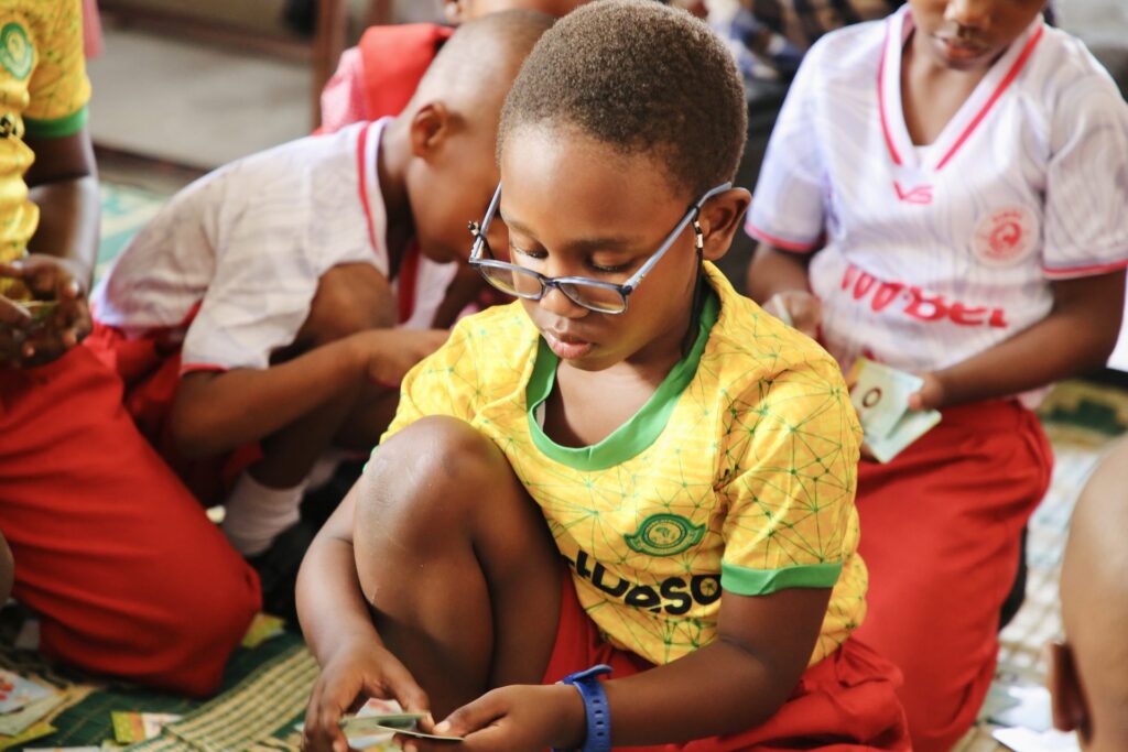 Studying reading cards with classmates