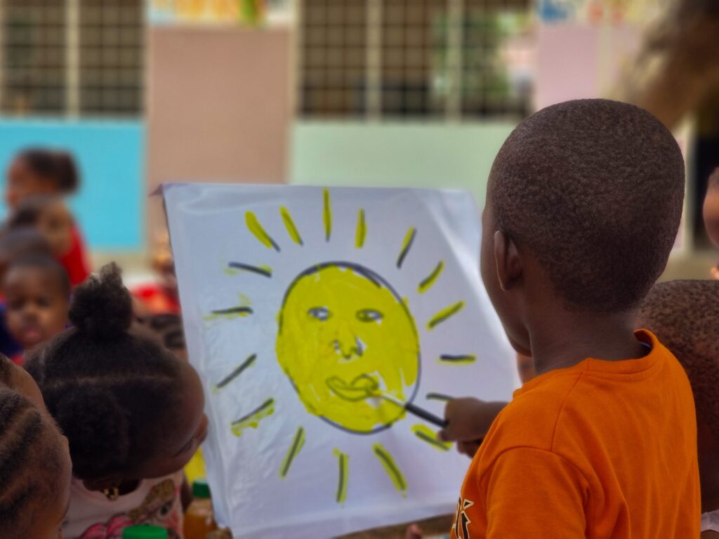 Finishing touches on a smiling sun