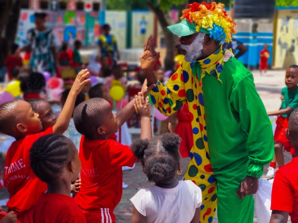 High fives from the visiting clown
