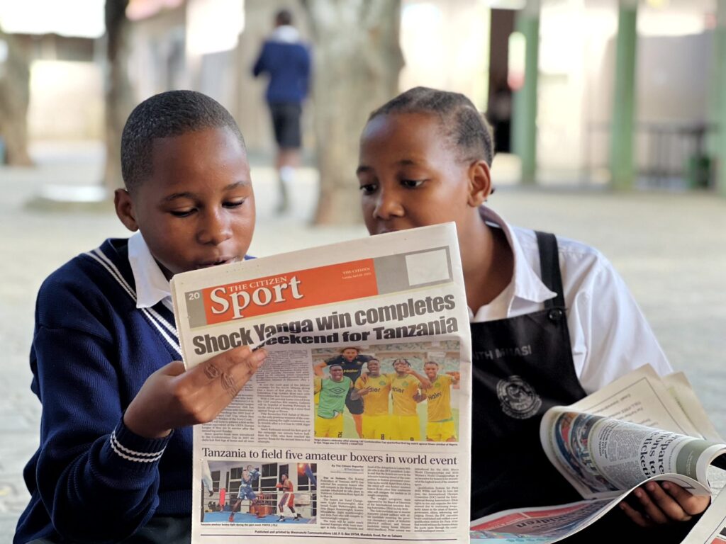 Sharing the sports section.
