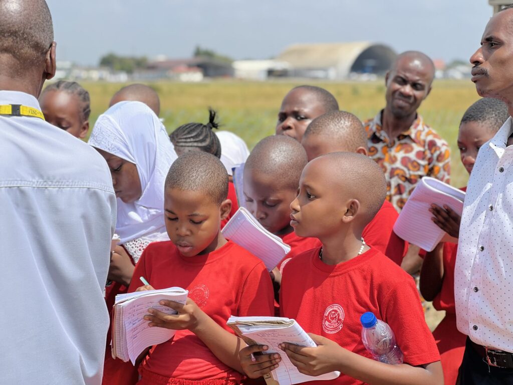 Taking notes during the welcome briefing