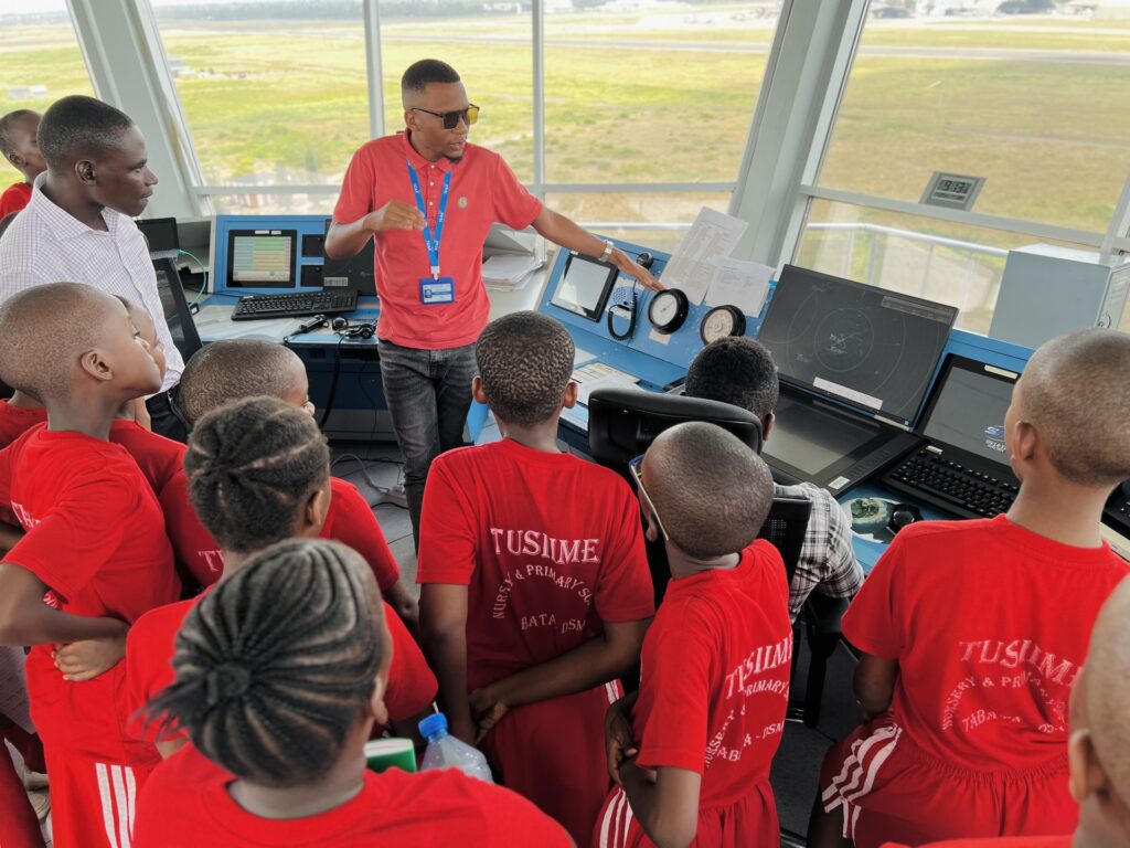 An air traffic controller explains the tower equipment
