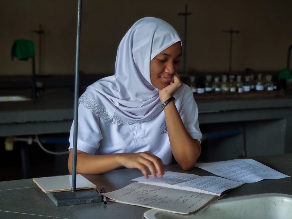 Reviewing notes in the chemistry lab.