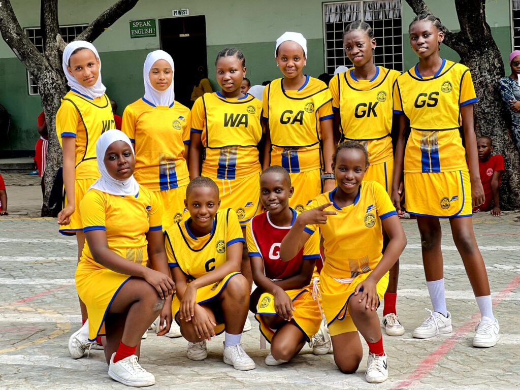 The netball team lines up before a match.