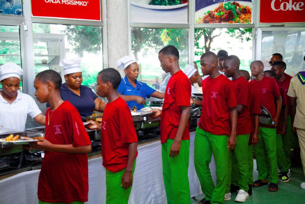 Lunch is served - queueing up after a morning of adventure.