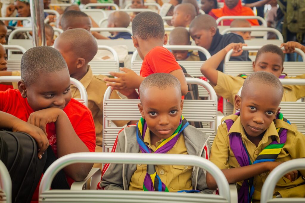 Young scouts settle in for the ferry crossing to Zanzibar.